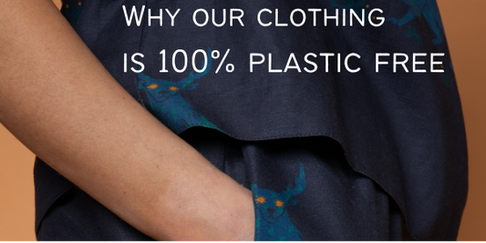 A model reaching into pocket of Wild Clouds blue beast trousers