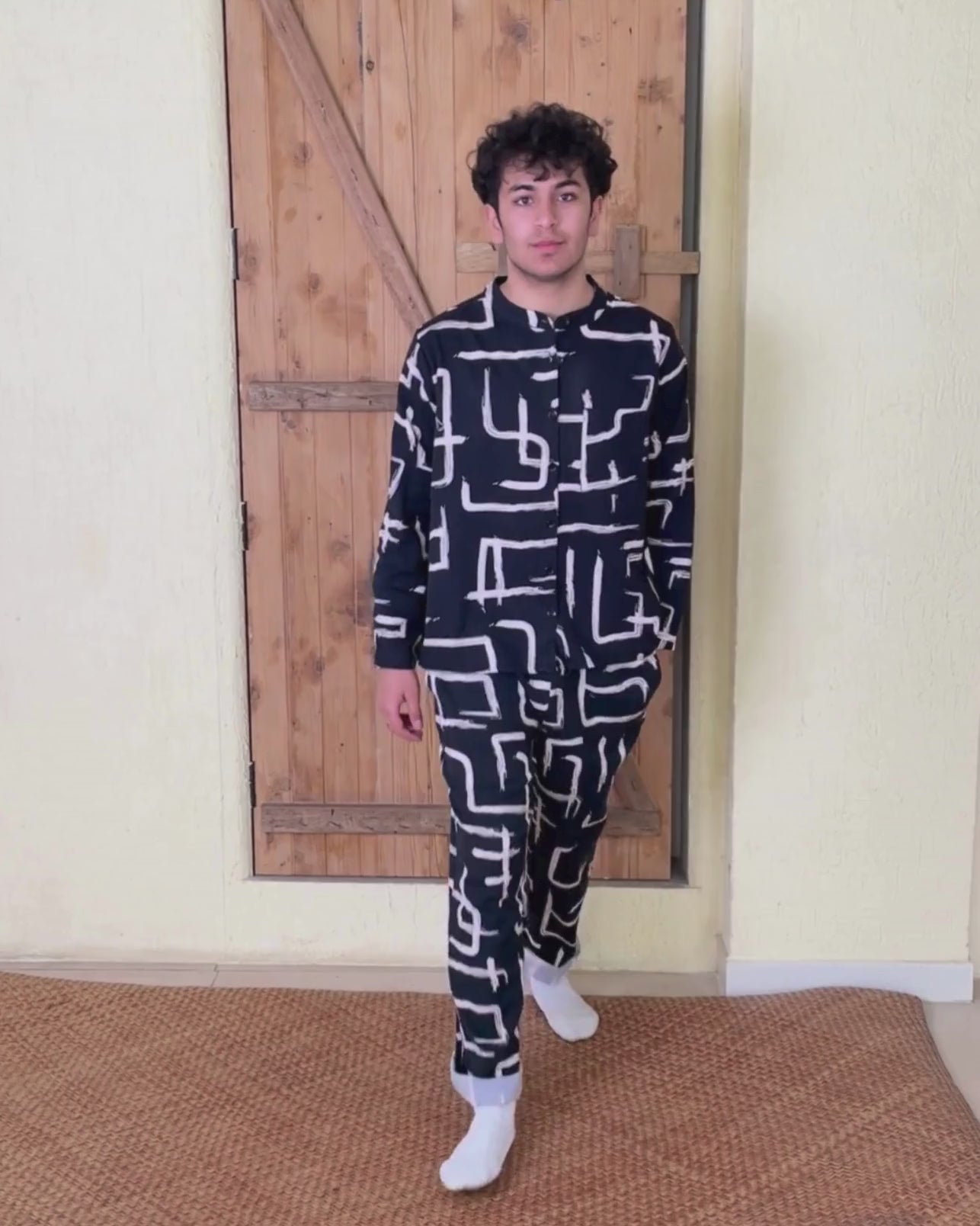 Black and white shirt and trousers in motion