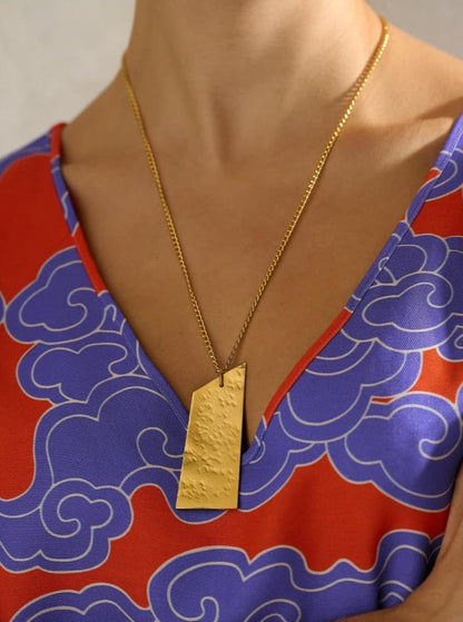 Wild Clouds Made in UK hammered abstract brass pendant necklace